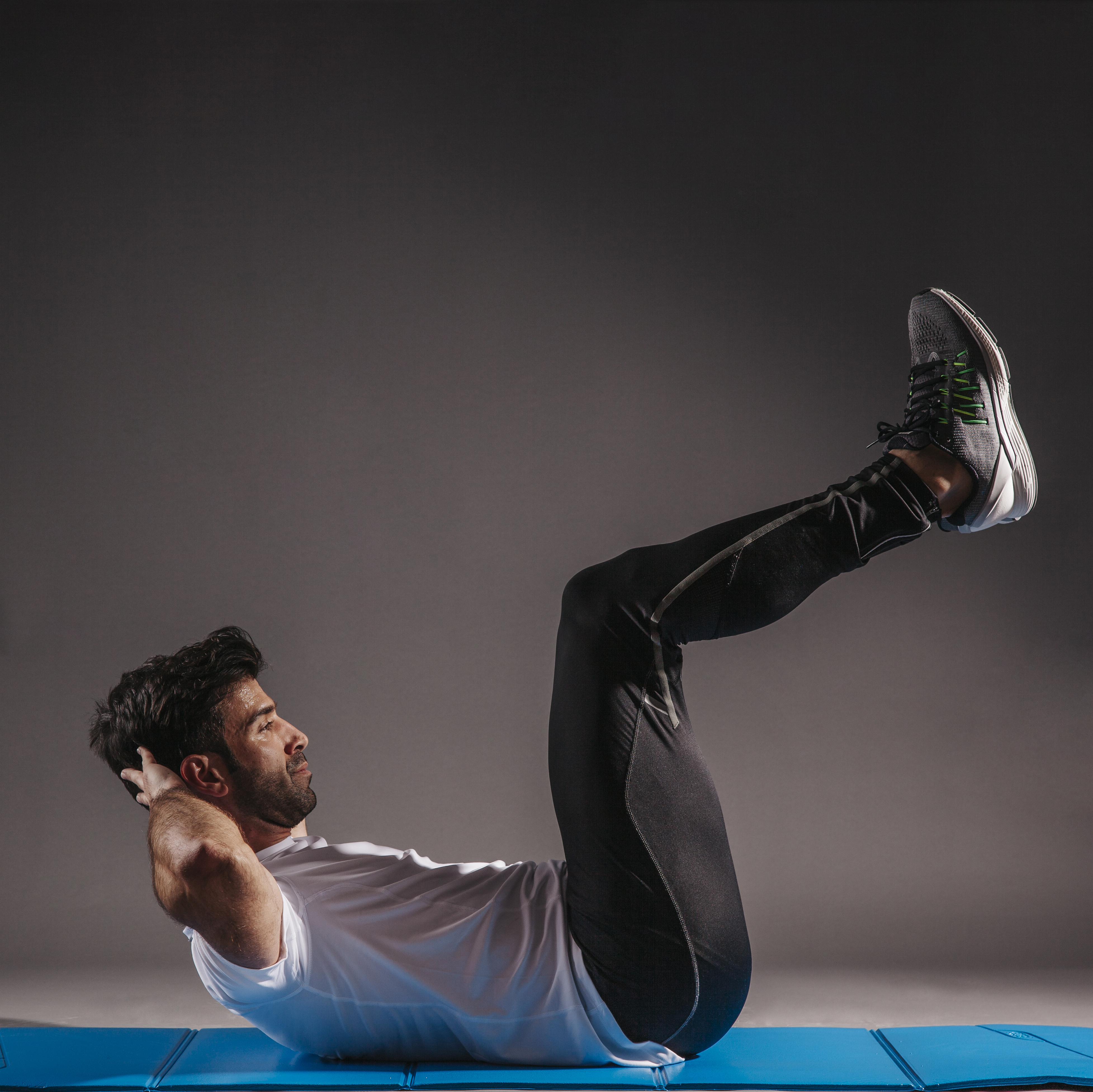 man-performing-abdominal-crunches